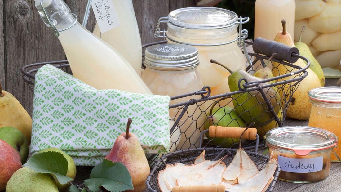 Display of products made after learning how to preserve fruit including juice, chutney and dried pear