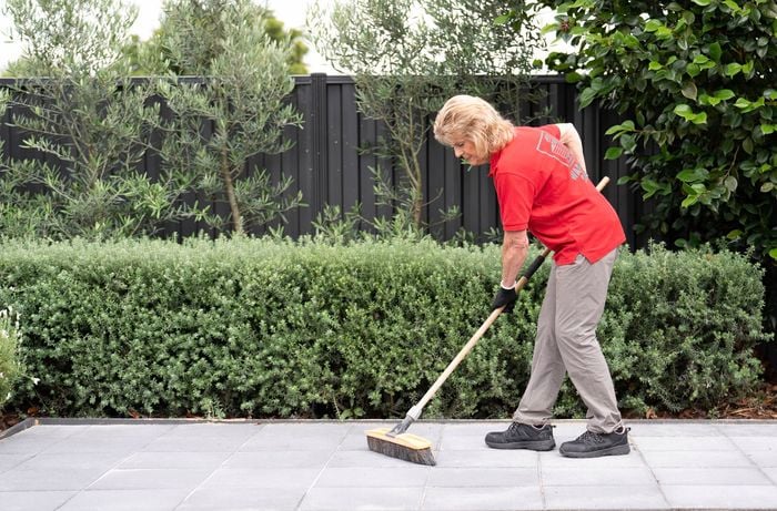 Clean the pavers to remove any loose dirt and debris