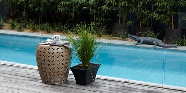 Pool with glass fence.