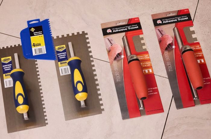 Adhesive trowels