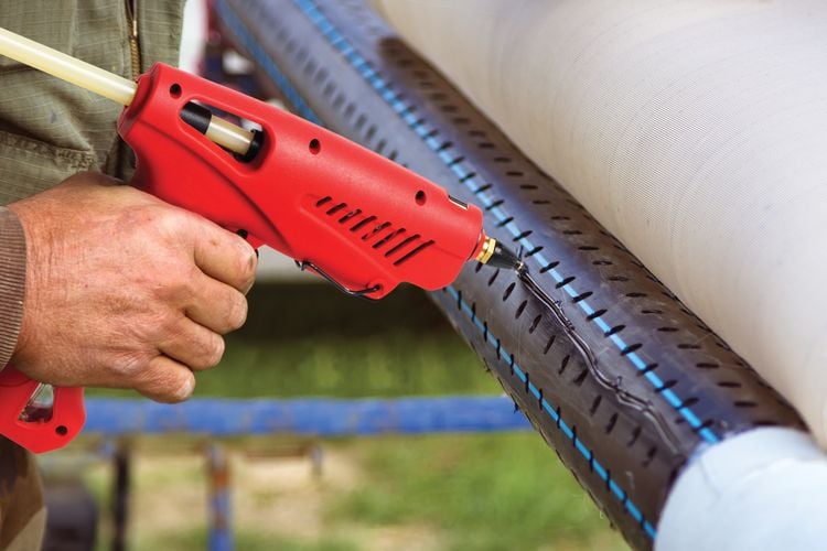 A Tradeflame product used to create a line of hot glue on a PVC mesh