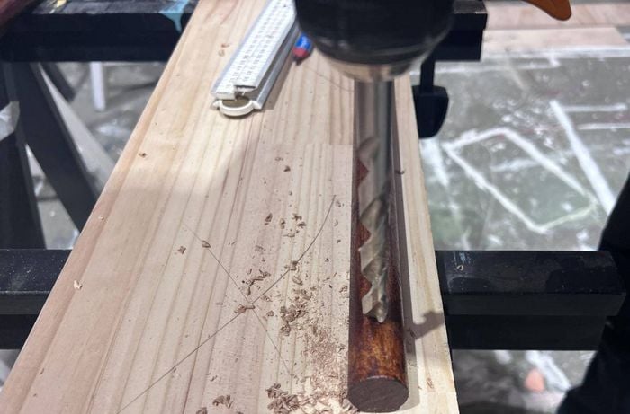 Drilling holes in a stained dowel