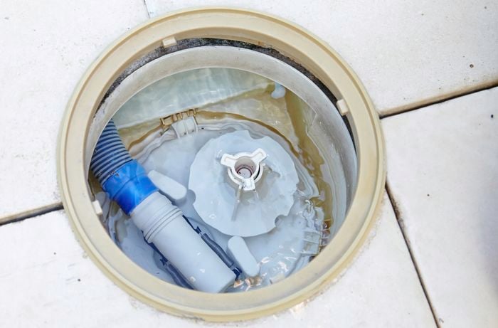 A cleaned out pool skimmer box