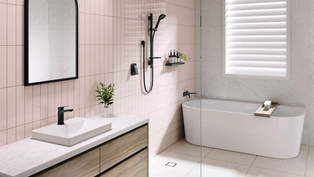 Modern pastel pink bathroom with Airstream black shower