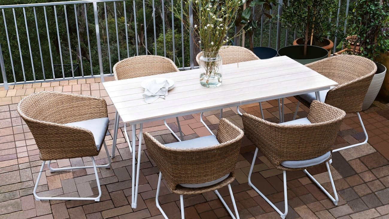 Timber-look dining table with powder coated steel legs