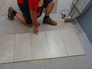 DIY Step Image - How to lay floor tiles . Blob storage upload.