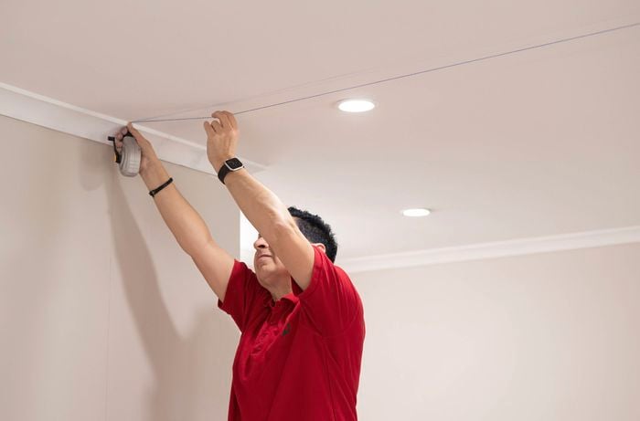 Mark the ceiling using a chalk line 