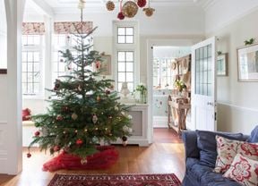 A decorated Christmas tree in a living room