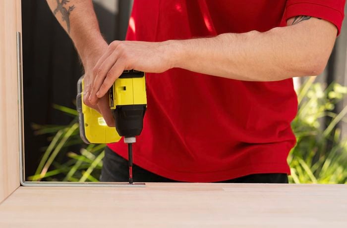 Assemble a timber benchtop using brackets and a drill driver