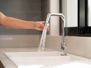 Finished swivel tap head installation on a kitchen sink tap