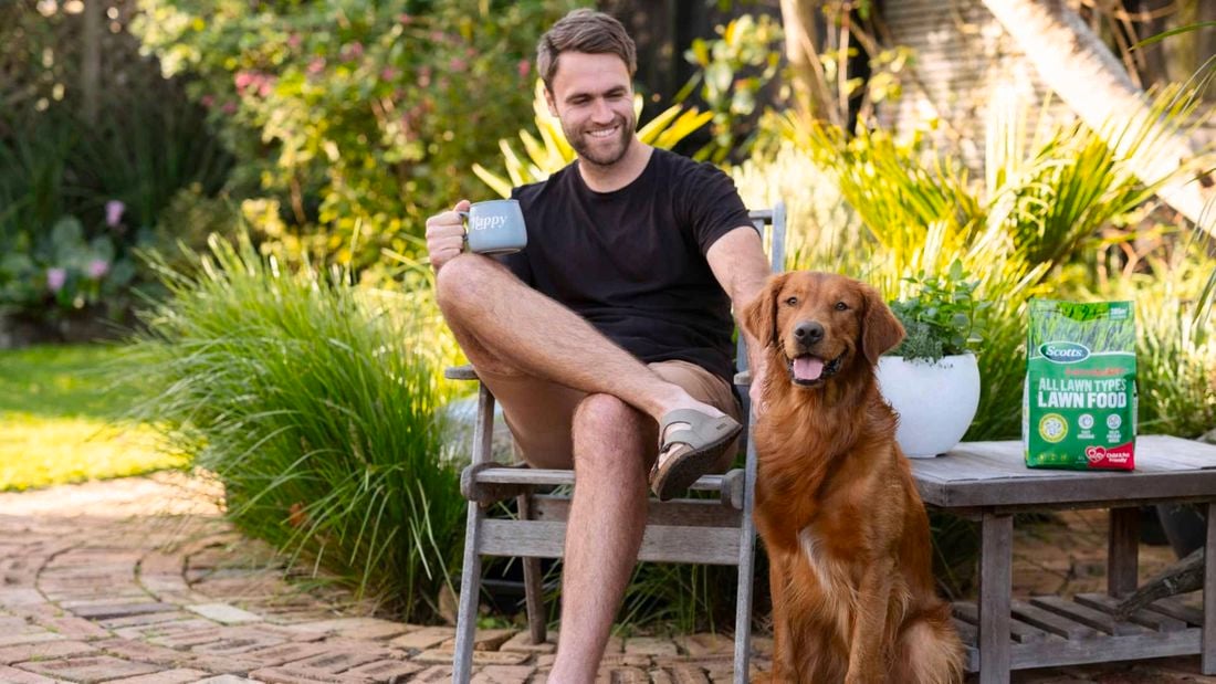 Man sitting with his dog.