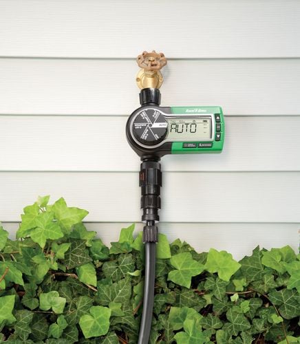 Automated watering timer unit connected to a garden tap