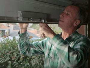 Man fixing garage door