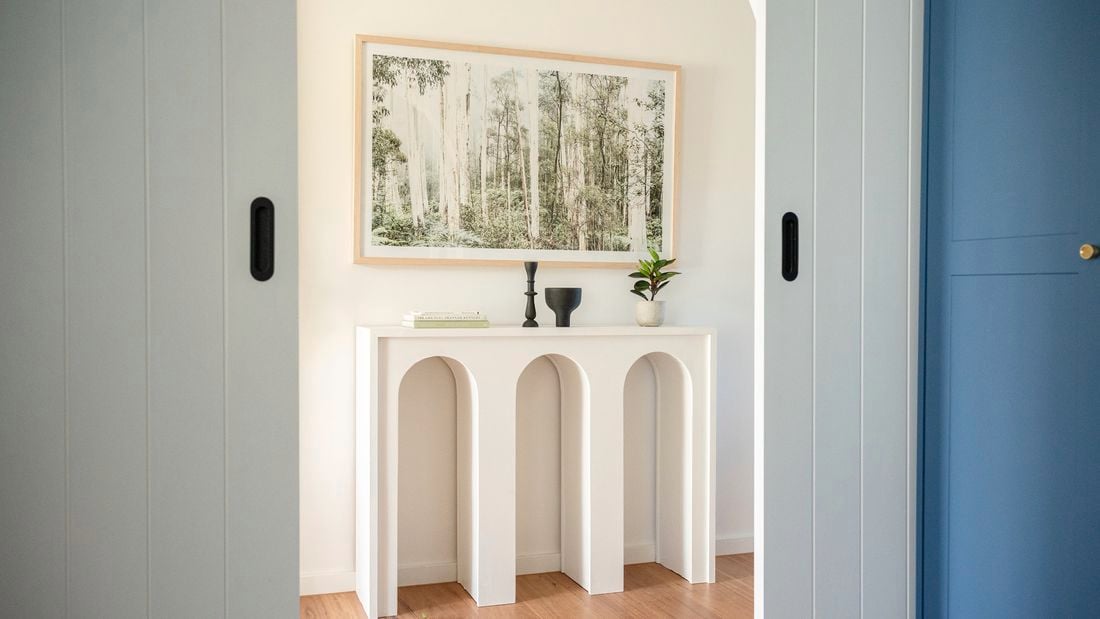 white arch console table