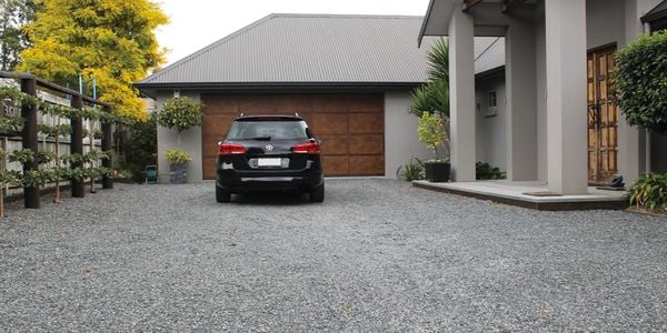 car parked in a gravel road