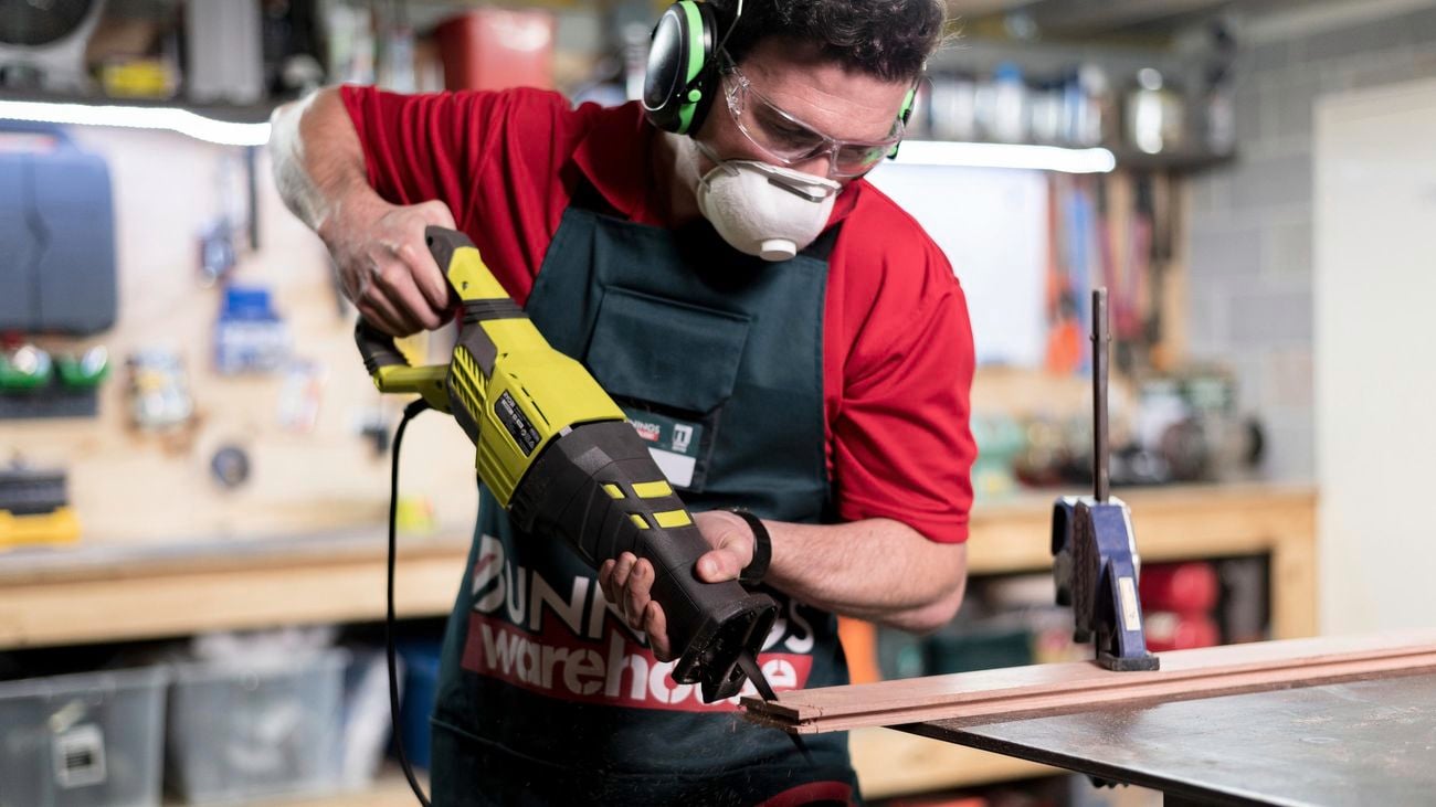 TM showing how to us a reciprocating power saw