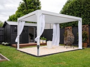 outdoor space with sheer curtains, egg chair