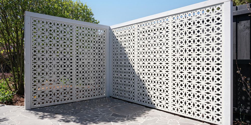 outdoor area with outdoor screens, trees