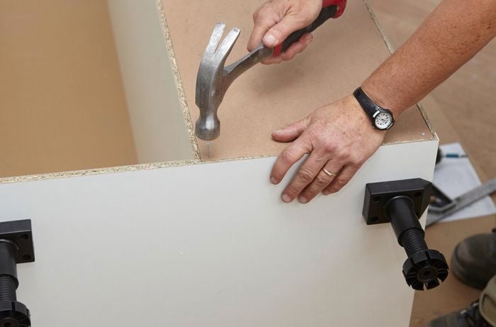 Person hammering 