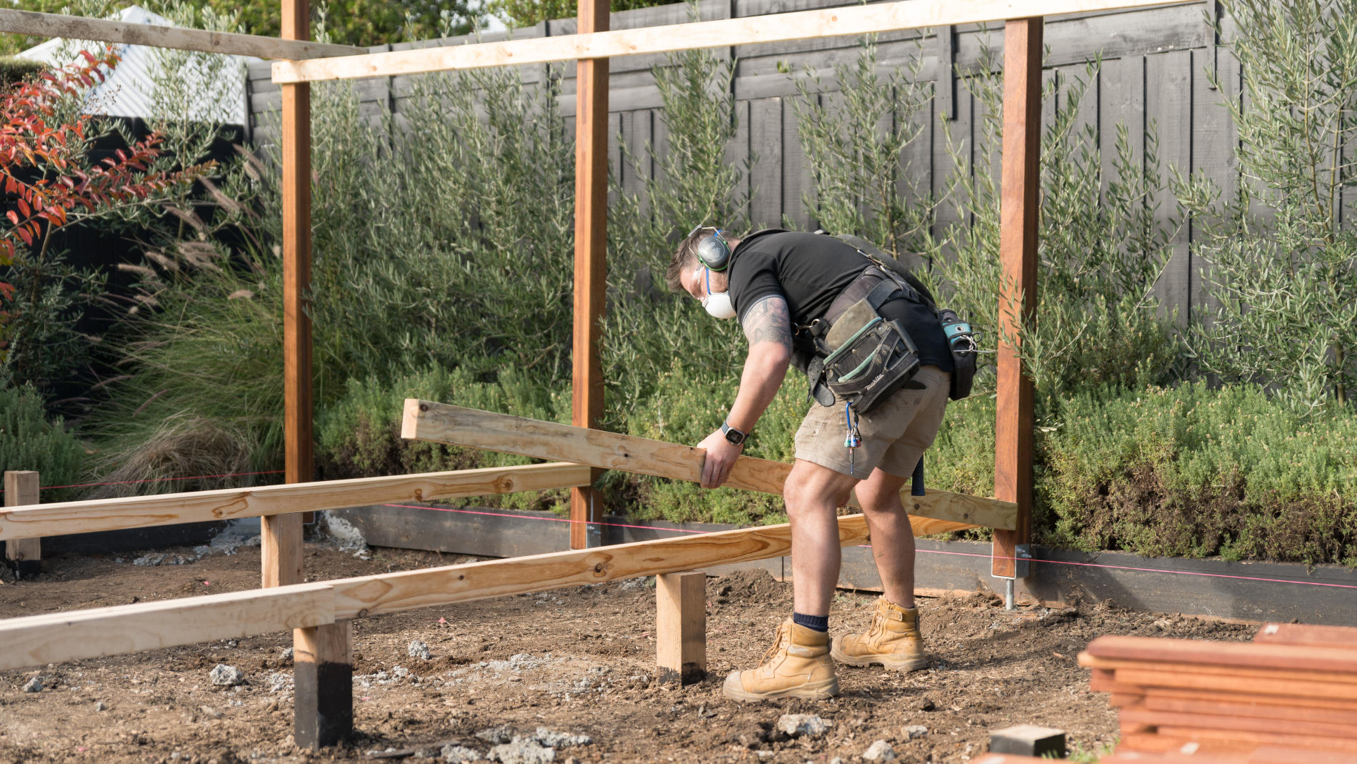 Using a string line to measure the deck's dimensions