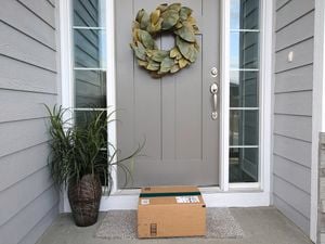 Parcel waiting on front door step.
