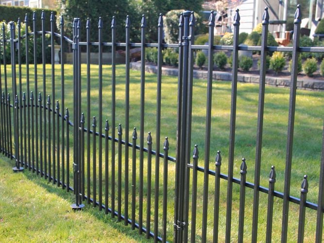 Steel fencing system on front yard.