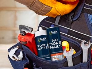 Builder's tool belt with close-up of Bostik products