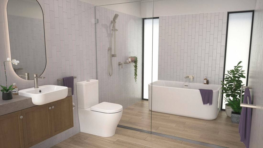 Modern bathroom with timber floor and white bath, basin and toilet