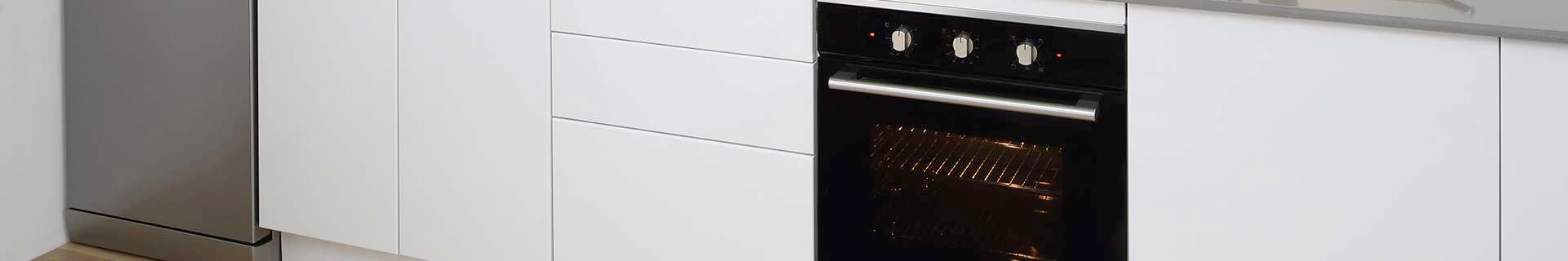 Kitchen with black oven.