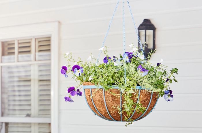 A blue upcycled hanging planter