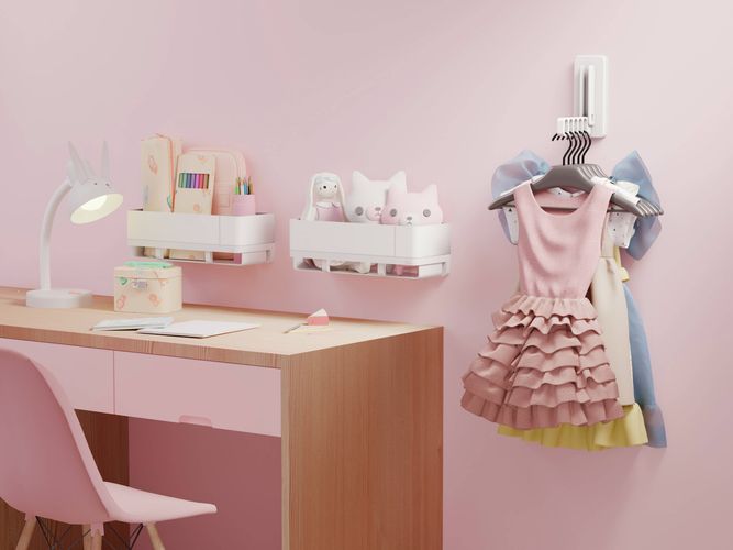 3M Command Products used in a child's room to mount wall shelves and hang clothing on hangers beside a study desk.