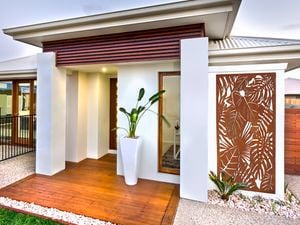 Front of timber and white home