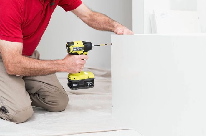 Assemble the top and back panels using cordless drill