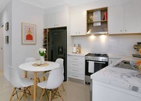 A picture of a renovated kitchen.
