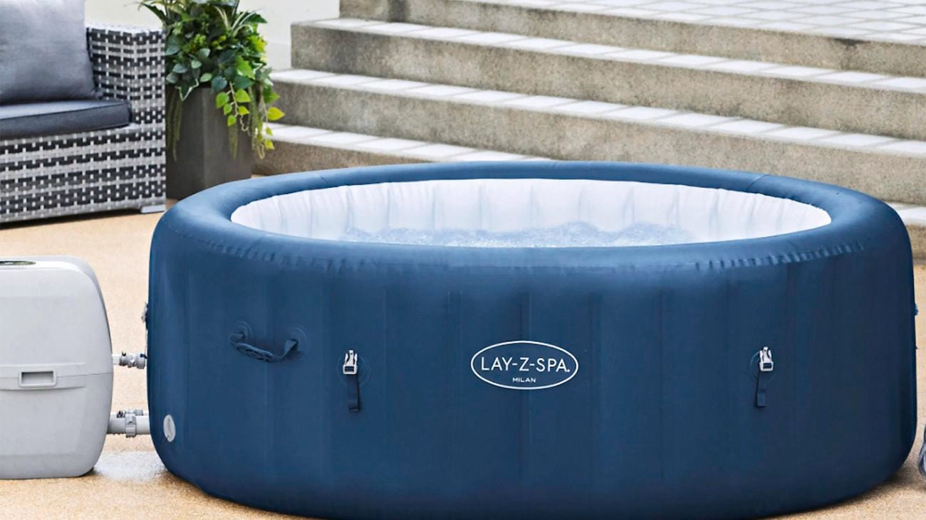 Bestway Lay-Z-Spa Milan Airjet inflatable spa in a backyard