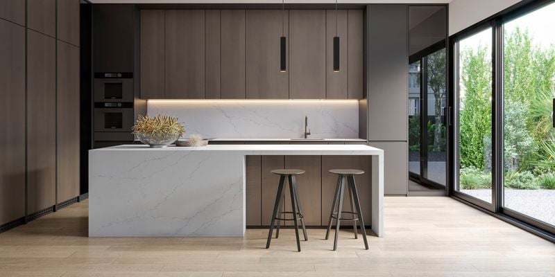 Modern brown kitchen with stone white benchtops.