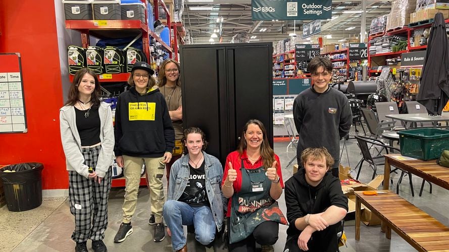 trade teens prog - teens participating in activity at store