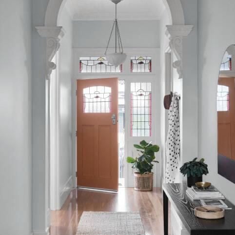 Styled hallway with arch.