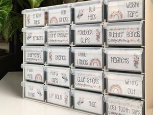 Toolbox with drawers labelled to hold craft items.