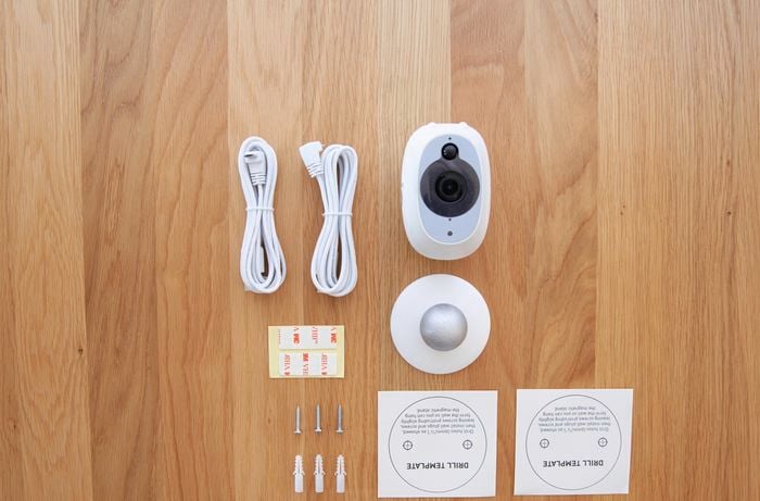 The components of a Swann smart security camera unpacked