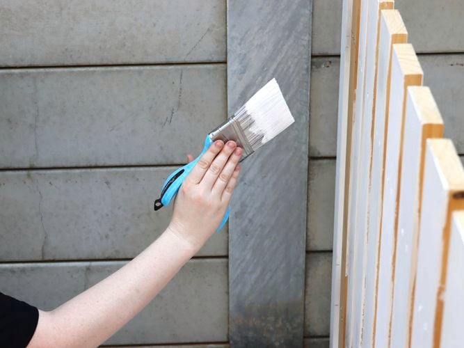 A person holding the FreeForm paint brush.