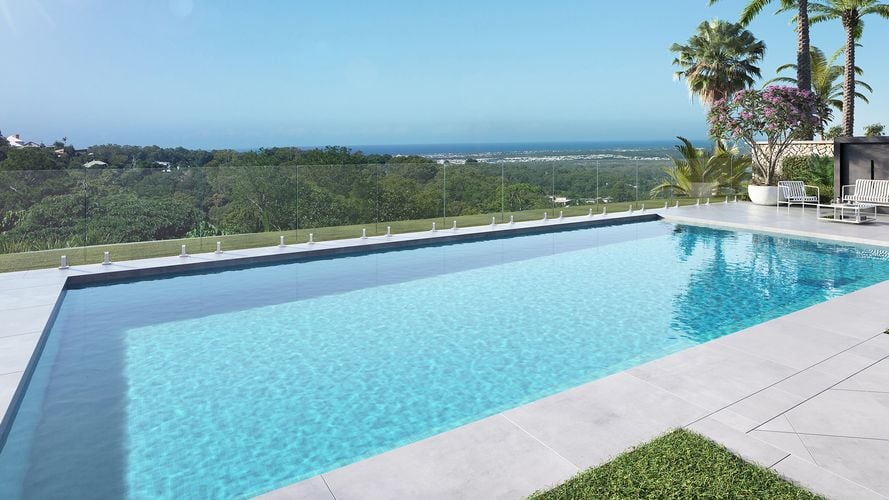 A pool overlooking a view of the coastline