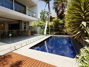 Pool with glass fence.