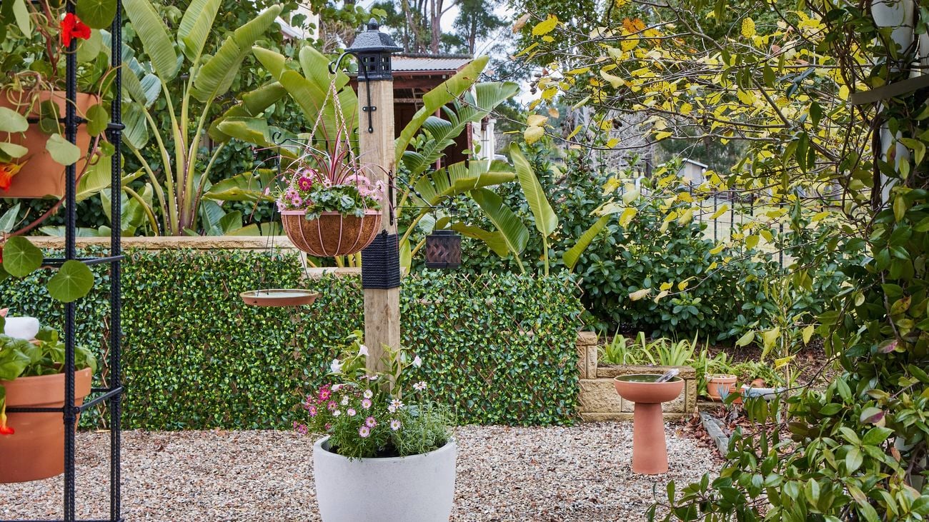 A D.I.Y. nature post photographed in a spring garden