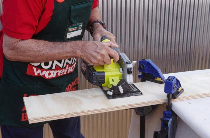 A piece of timber being cut to size with a circular saw