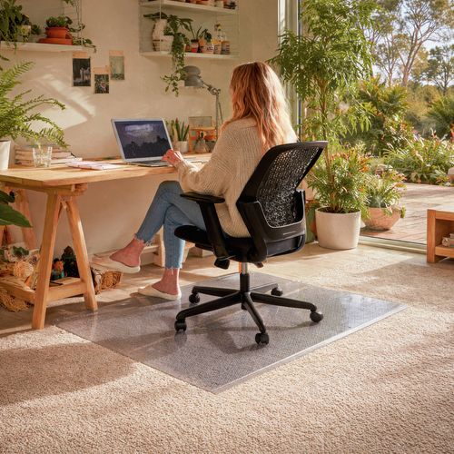 A clear PVC runner protects carpet from wear at your home office desk, plus has grip studs preventing movement.