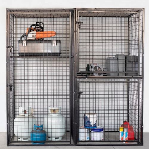 Gas cylinders and cans of paint stored in a secure cage combo.
