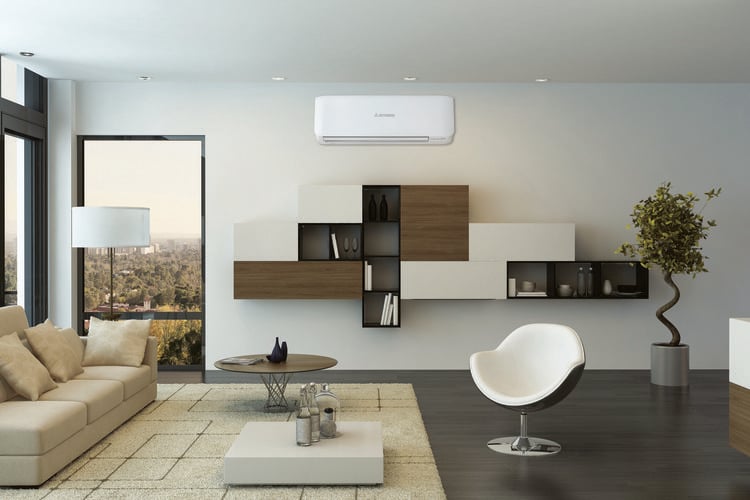 Interior of triangle-shaped timber building with white couch, white mirror and air conditioning unit