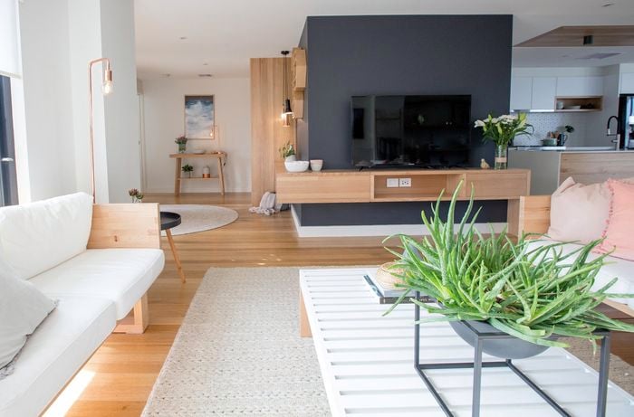 Lounge room with two lounges facing each other and a slat coffee table