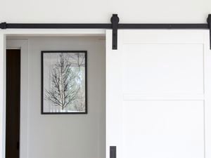 Sliding door on a door track